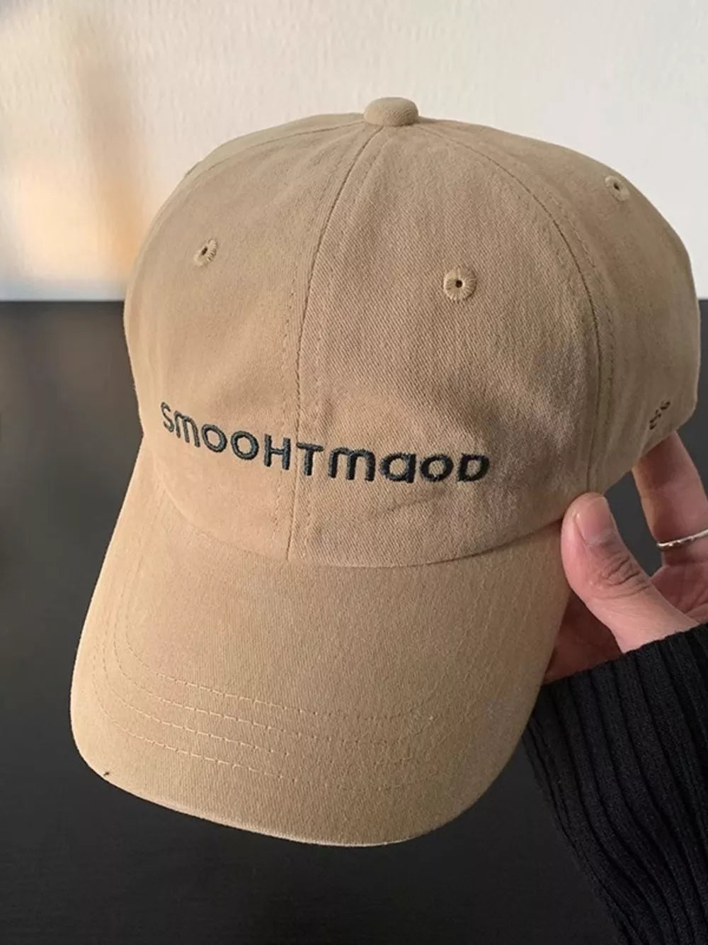 Chic embroidered text cotton hat in camel, a stylish baseball cap accessory.