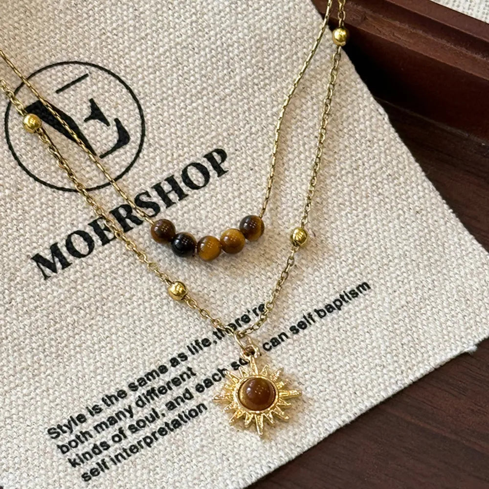 necklace in gold featuring layered and straight fit