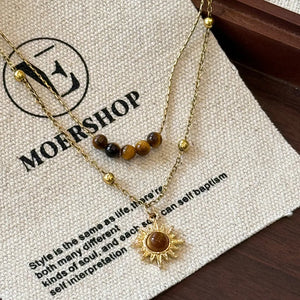 necklace in gold featuring layered and straight fit