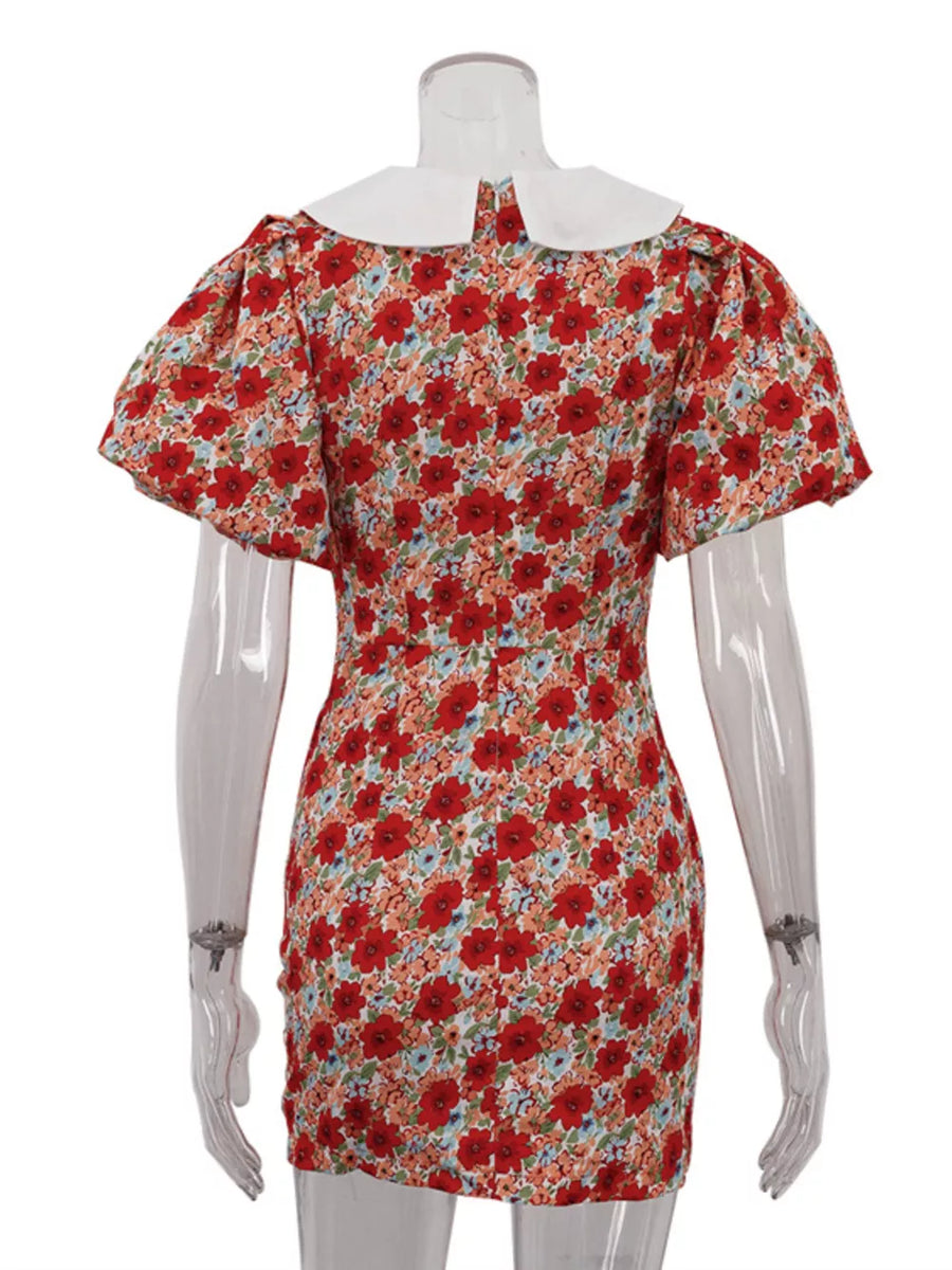 Red floral print dress with white collar and puff sleeves