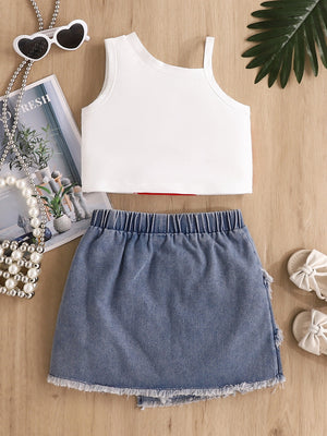 Baby denim skirt with distressed hem and white tank top.
