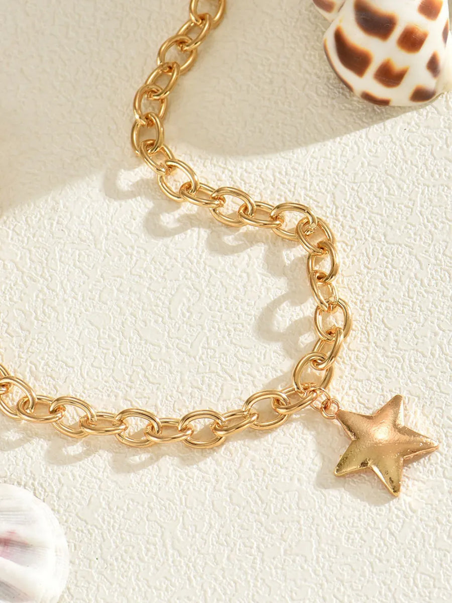 gold necklace with princess and clasp