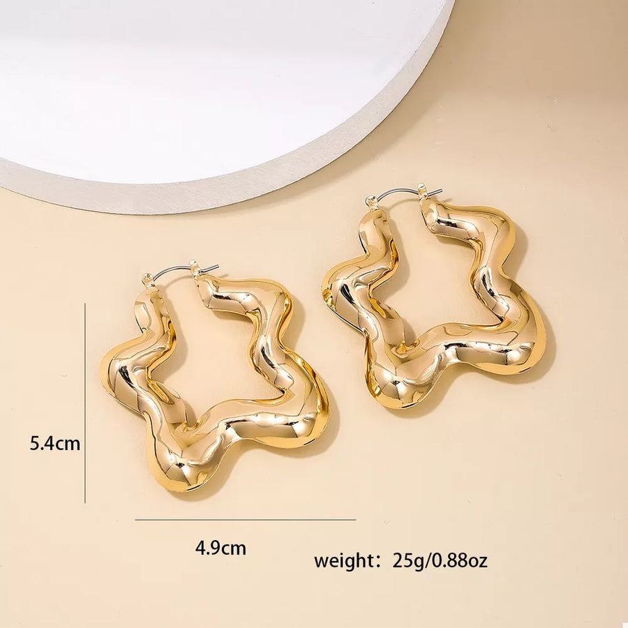 gold earrings with medium and hinged hoop