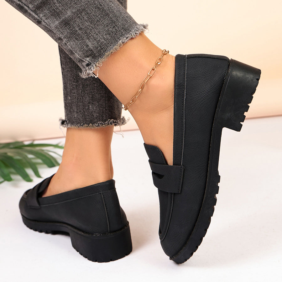 Classic Minimalist Penny Loafers in black with penny loafer strap