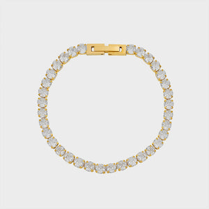 Gold pavé tennis bracelet with clear cubic zirconia stones and a gold clasp.