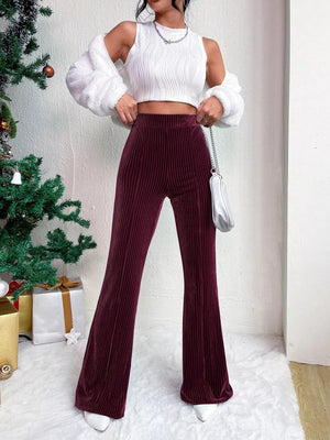Burgundy corduroy high-waist flare maternity pants with vertical ribbing.