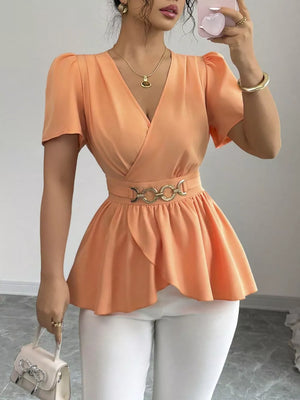 Orange surplice peplum blouse with belted waist and puff sleeves