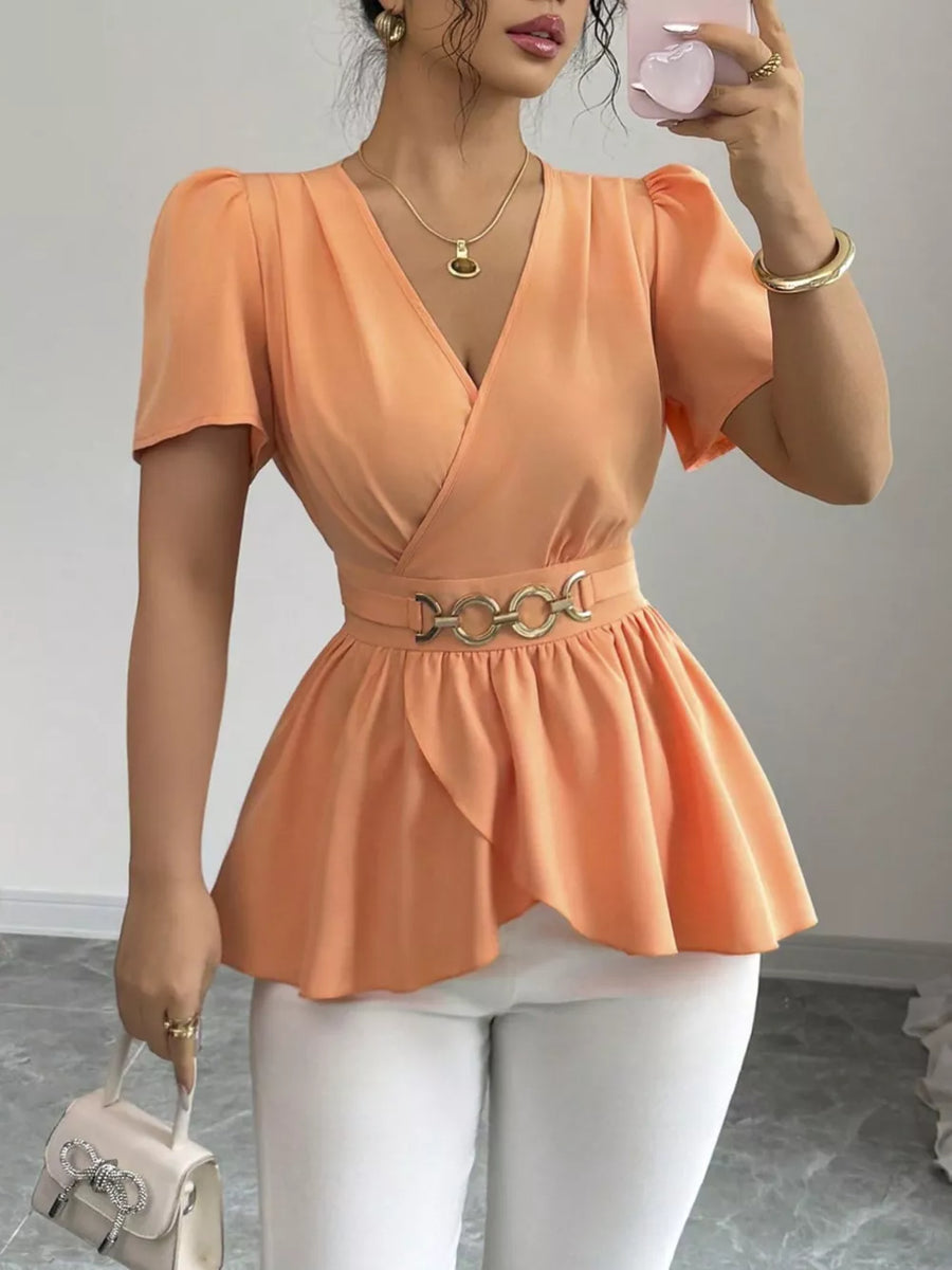 Orange surplice peplum blouse with belted waist and puff sleeves