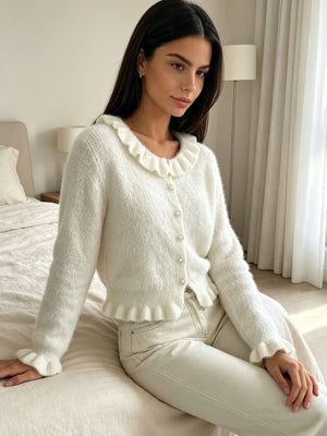blush pink cardigan with pearl buttons and long sleeve