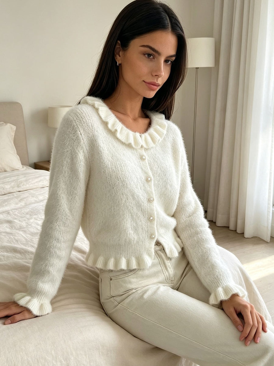 blush pink cardigan with pearl buttons and long sleeve