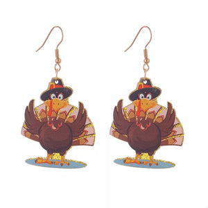 Festive turkey dangle earrings in Style F, acrylic with gold accents, featuring a cute pilgrim turkey design.