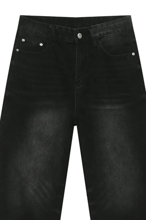 Faded black denim palazzo jeans with a high waist and wide leg.