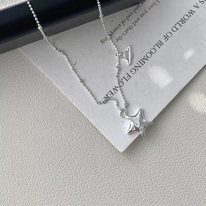 necklace featuring star in silver with 925 sterling silver Care instructions: Avoid wearing during exercise, as sweat w