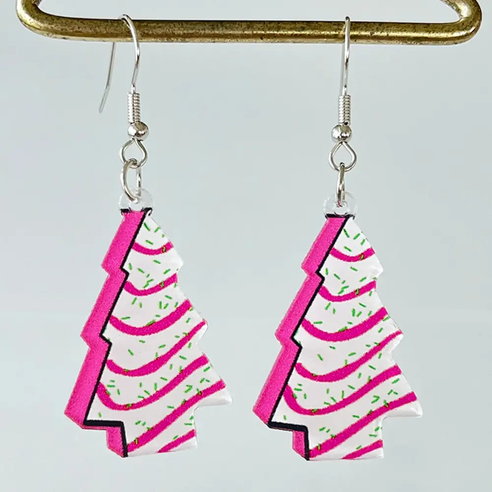 Festive acrylic tree earrings with pink icing and green sprinkles.