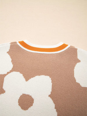 Tan floral pattern baggy sweater with striped crewneck.