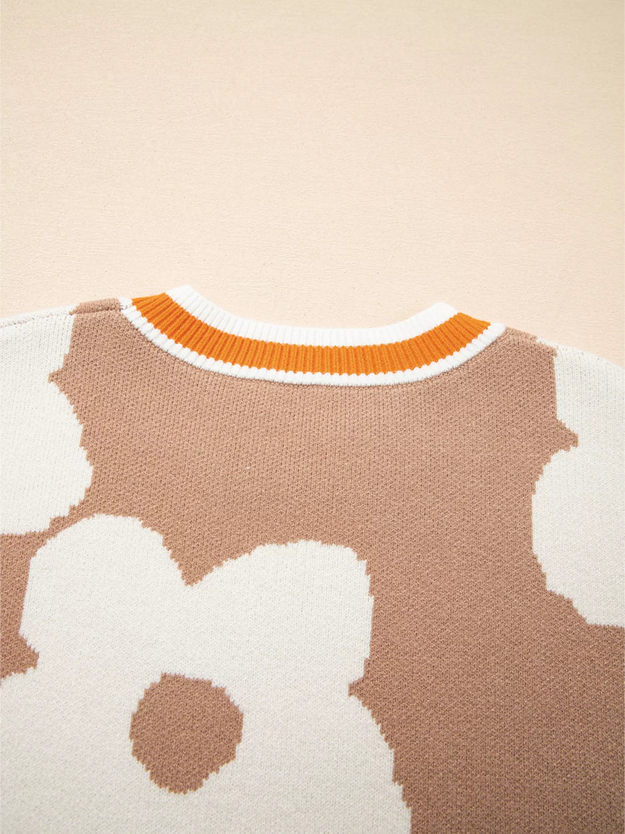 Tan floral pattern baggy sweater with striped crewneck.