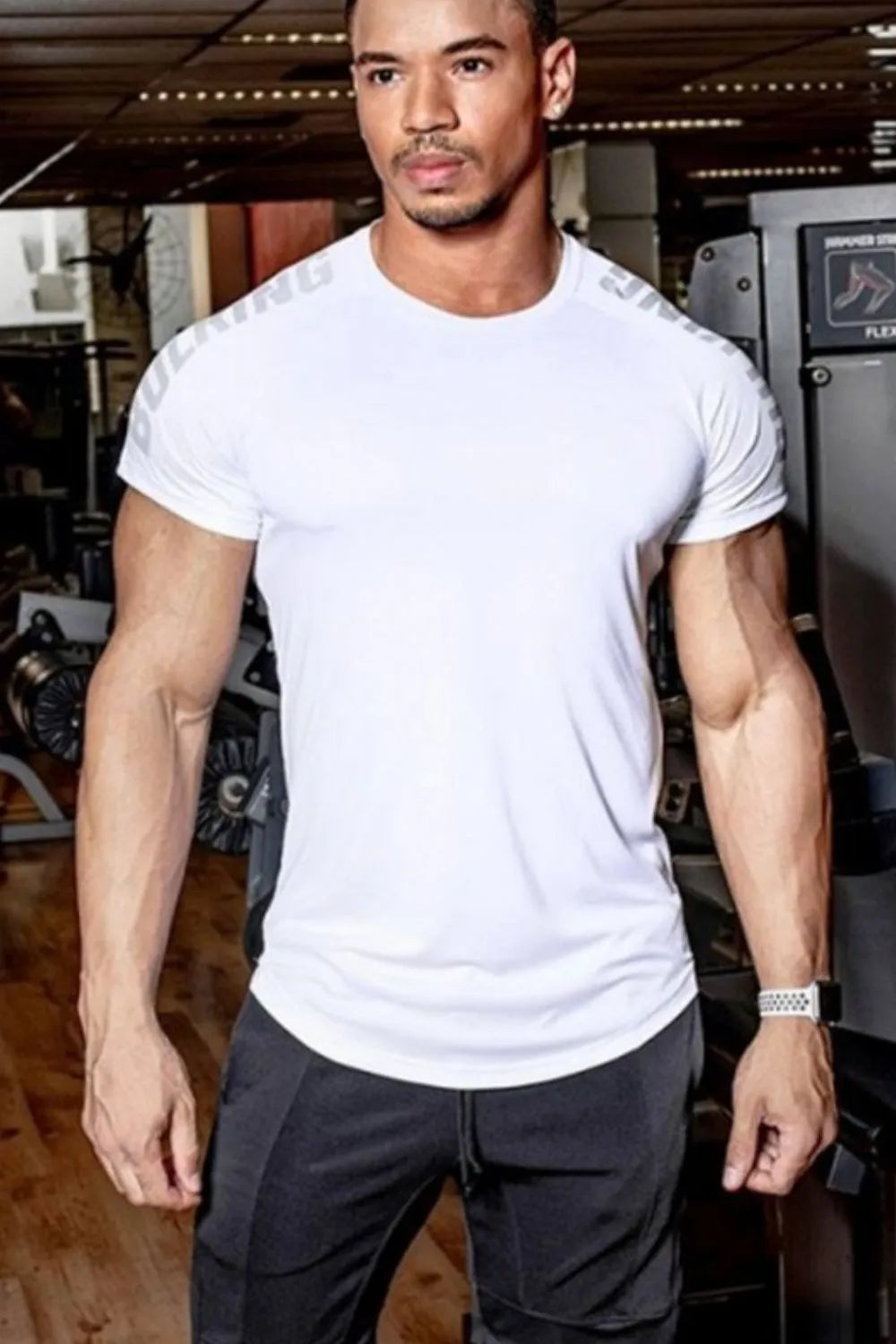 White performance t-shirt with grey shoulder print and short sleeves