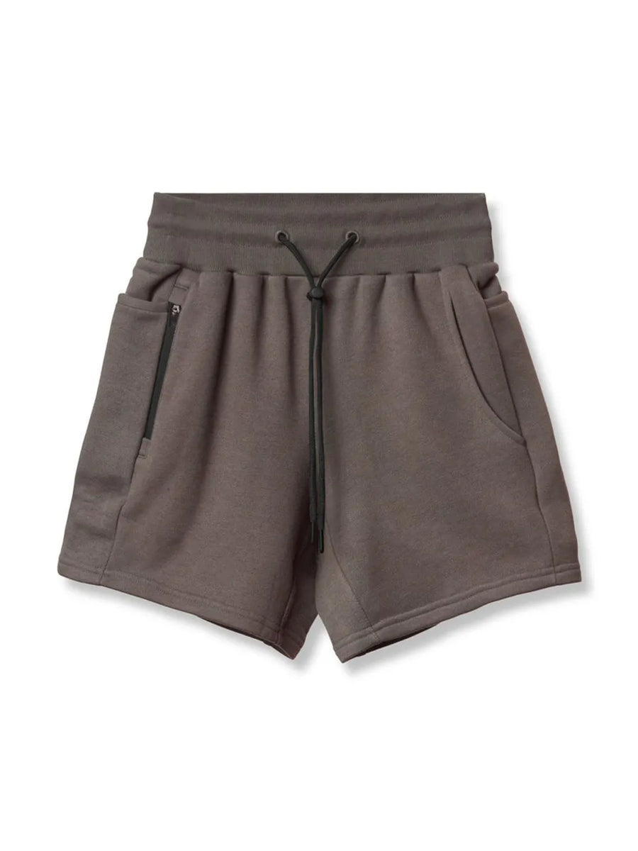 Performance fleece jogger shorts in coffee brown with drawcord and zippered pocket detail.