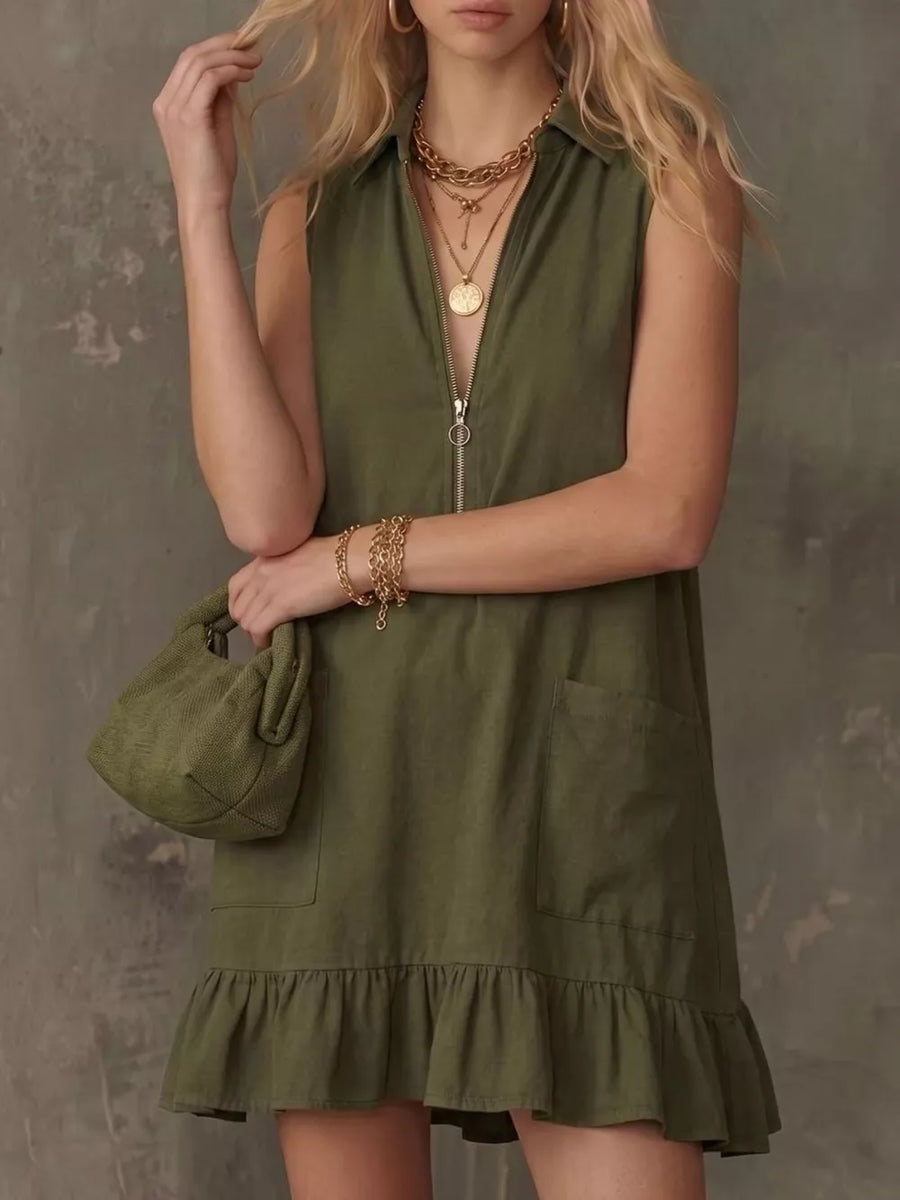 Sleeveless army green zip-front collared dress with ruffle hem and pockets.