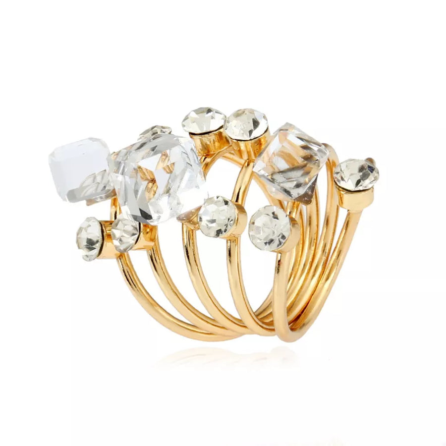 Gold-plated multi-layered ring with clear crystals and square gems.