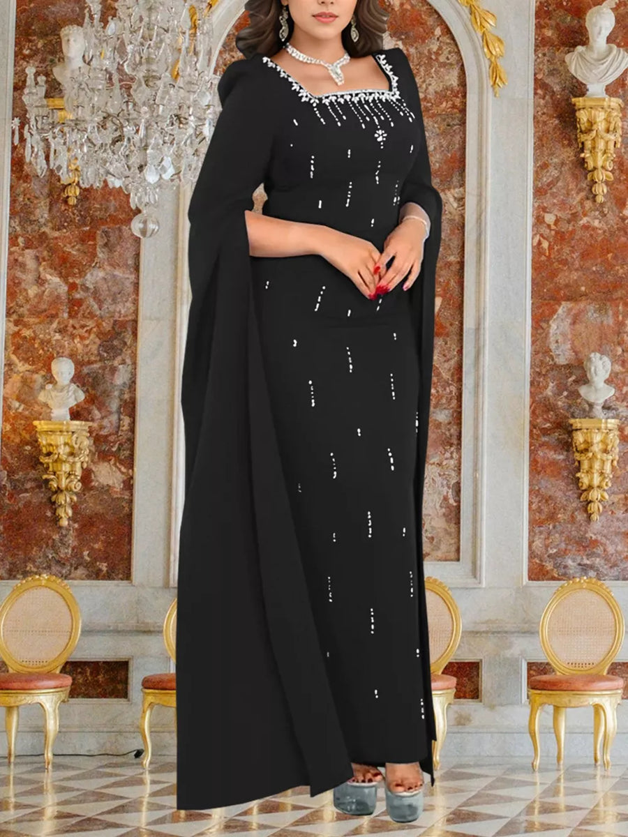 maxi dress in black featuring rhinestone and fitted fit