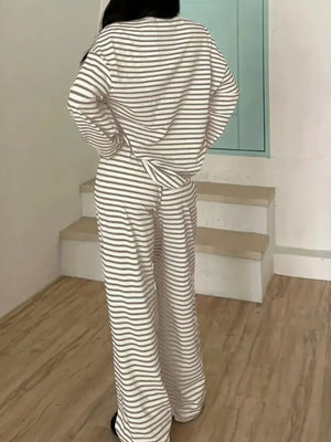 100% polyester Care instructions: Machine wash cold pajama set in gray with relaxed silhouette