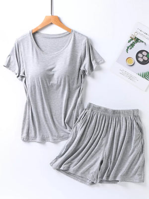 Heather Gray short sleeve pajama set with crew neck top and elastic waist shorts with pockets.