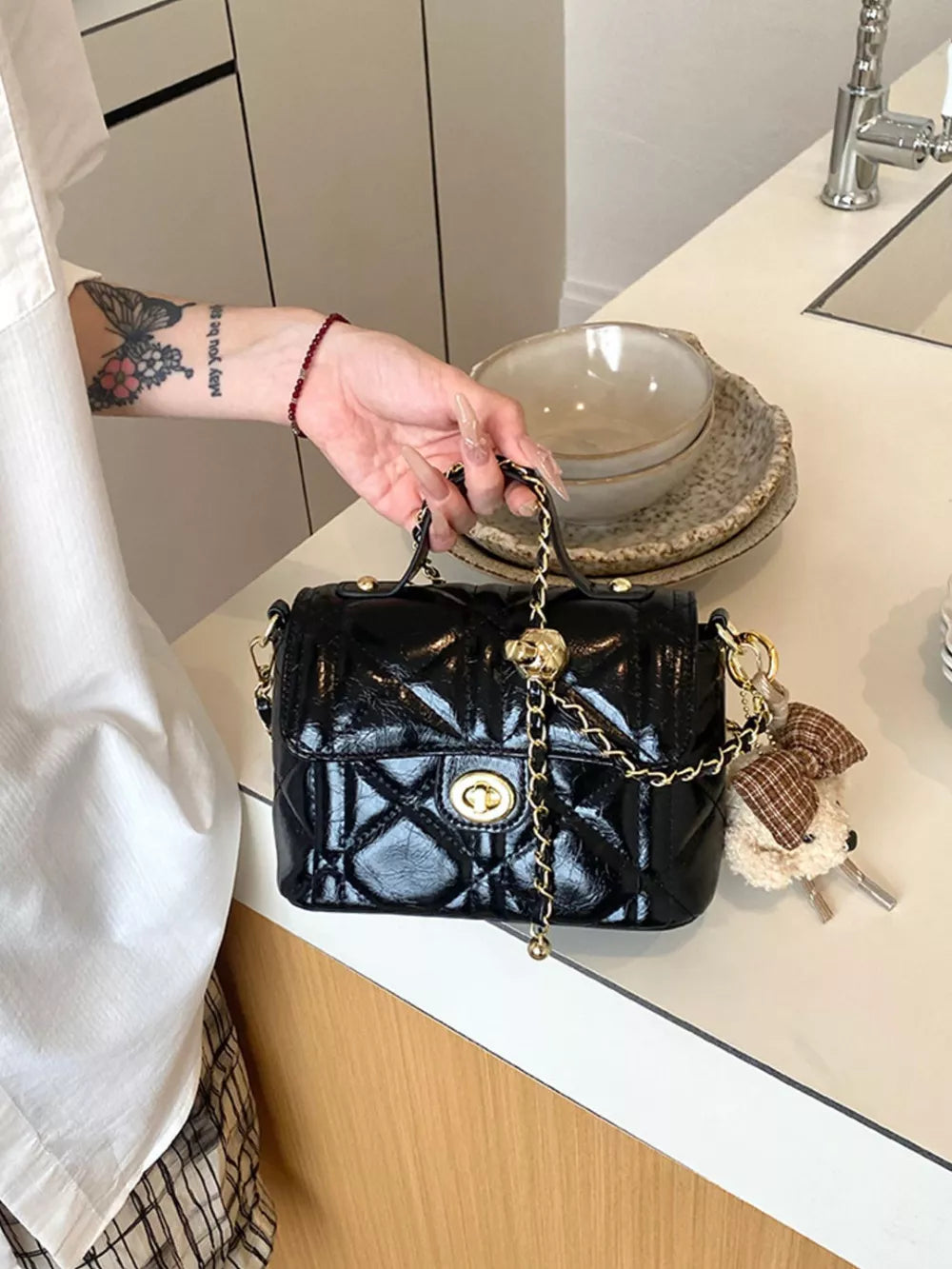 Black crossbody bag with small and turn-lock