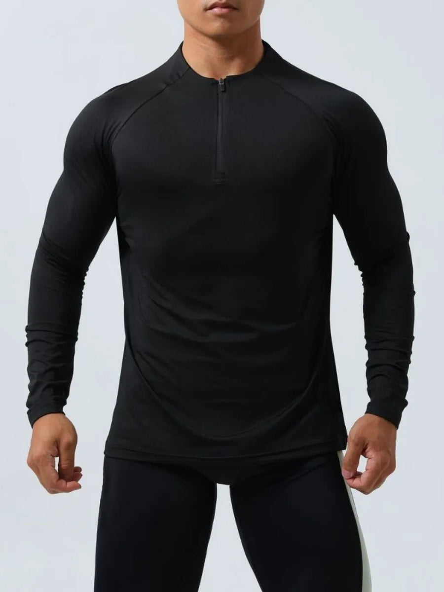 Black performance raglan zip-neck long sleeve active top