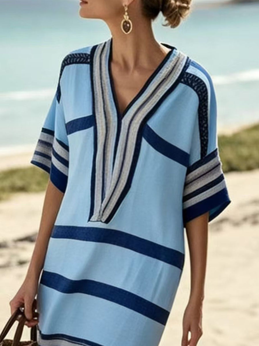 Blue striped half sleeve midi dress with V-neck and contrast trim.