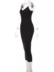 Black midi dress with spaghetti straps and V-neck, bodycon fit.