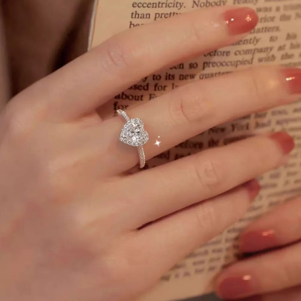 ring in silver featuring heart-shaped stone and fitted fit