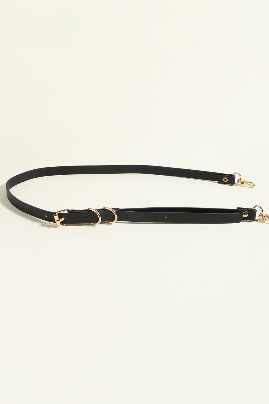 Black PU leather harness belt with gold chain detail and buckle