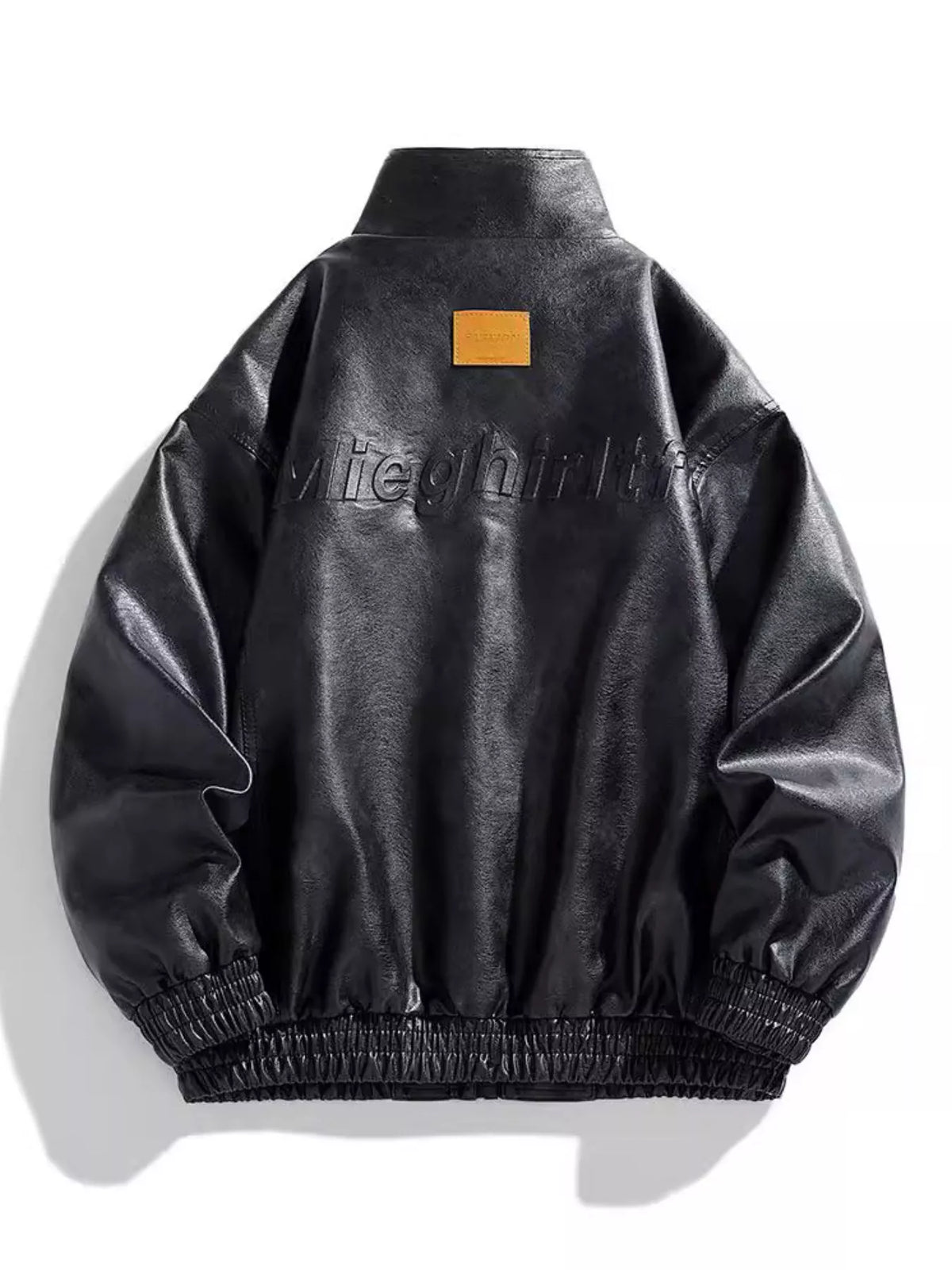 Black oversized snap down jacket with embossed text and elastic cuffs.