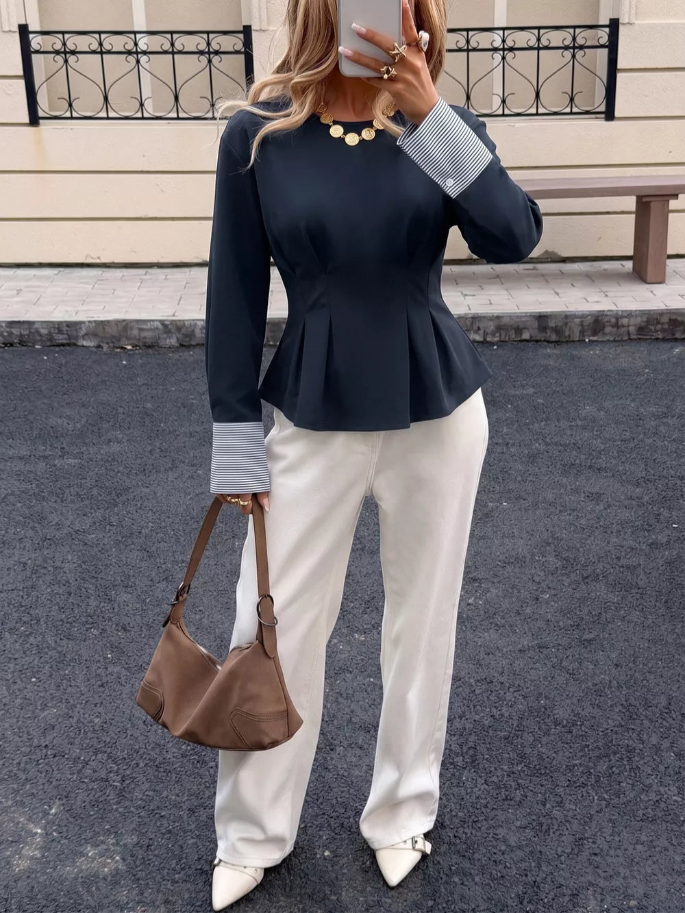 classic peplum top in navy blue with round neck