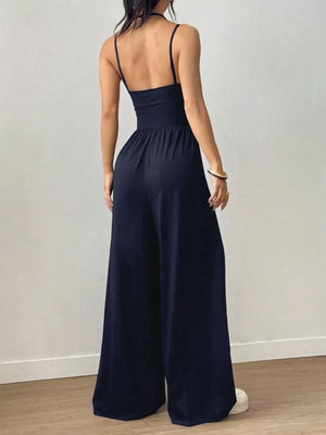 100% polyester Care instructions: Machine wash cold jumpsuit in Black with flared silhouette