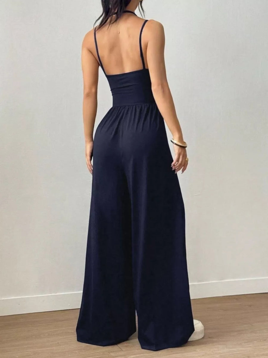 100% polyester Care instructions: Machine wash cold jumpsuit in Black with flared silhouette