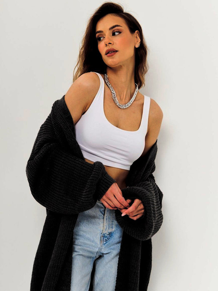 Black oversized ribbed knit maxi cardigan with balloon sleeves.
