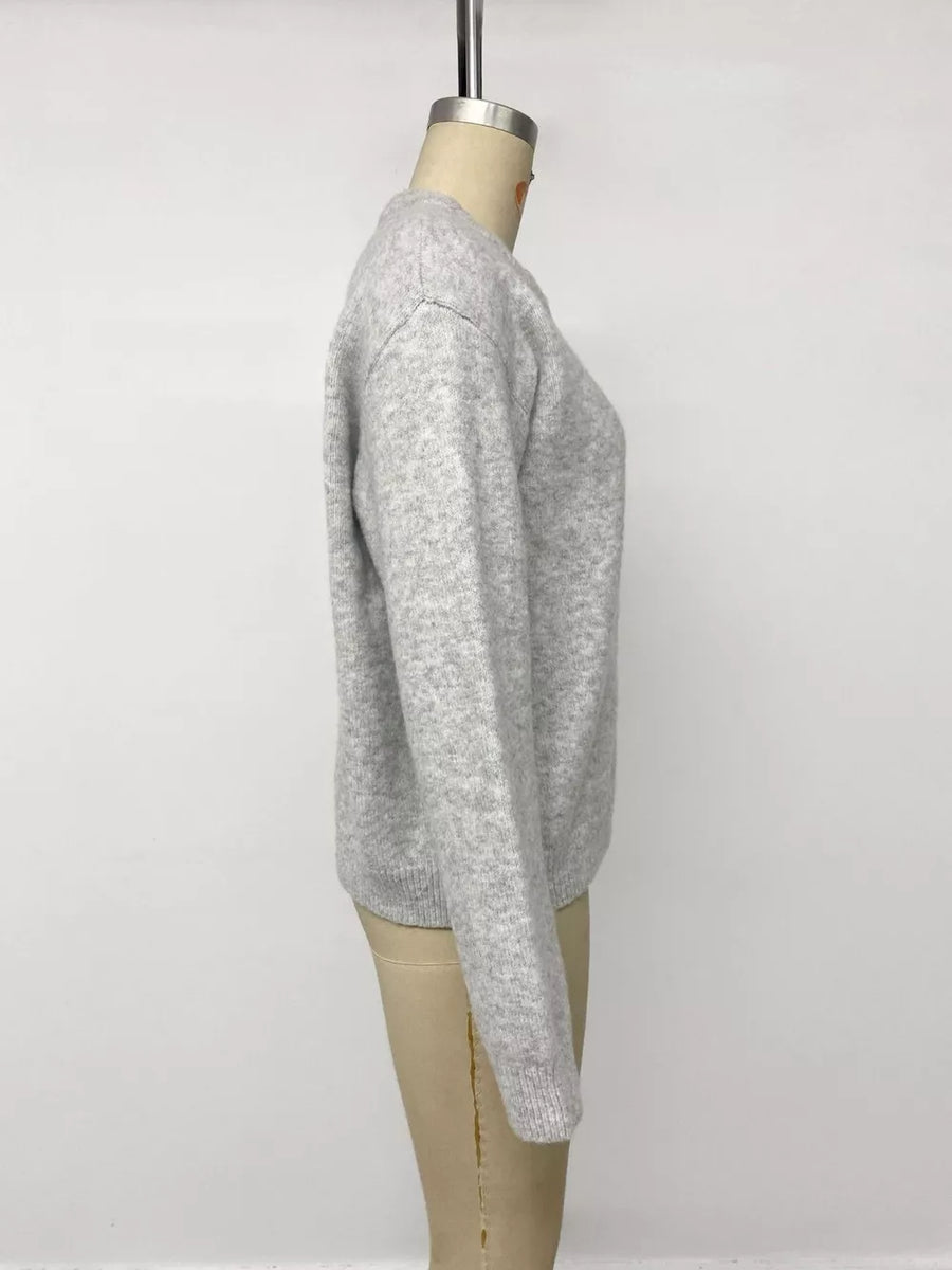 cardigan in light gray with buttoned and hip-length