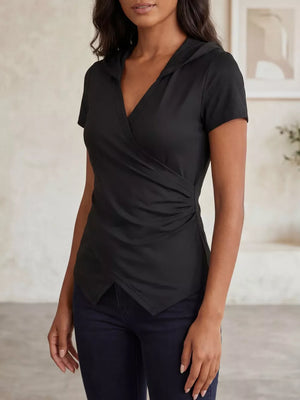 Black ruched hooded t-shirt with wrap front and asymmetrical hem.