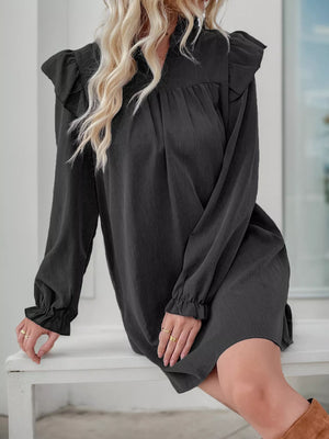 Dark gray ruffled notched sleeve dress with cinched cuffs and a gathered bodice.