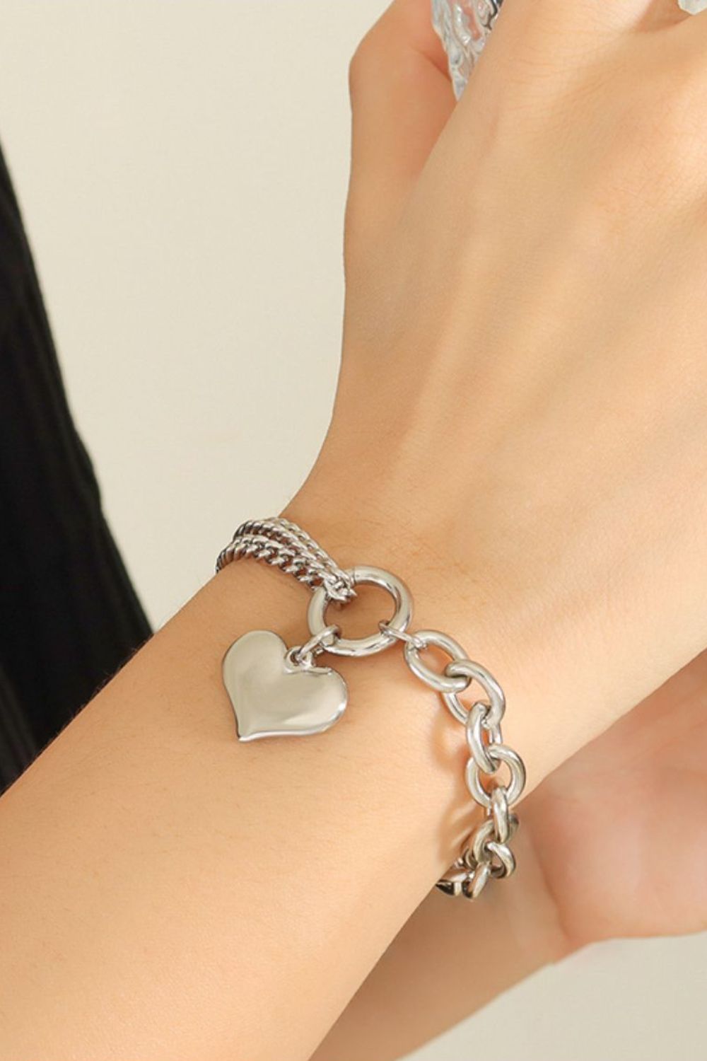 Silver chain bracelet with heart charm