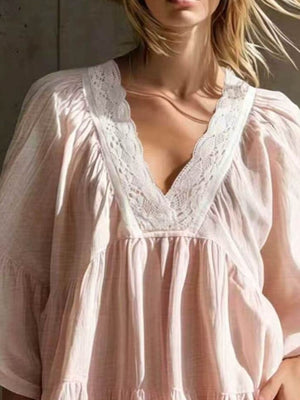 romantic mini dress in Black with v-neck