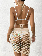 Tan crochet cover up skirt with iridescent sequins, open knit design.