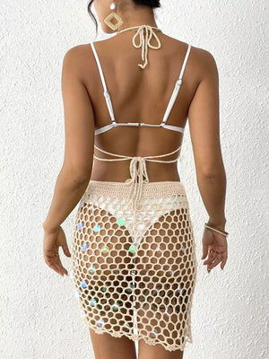 Tan crochet cover up skirt with iridescent sequins, open knit design.