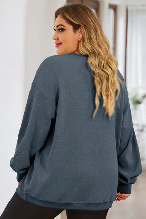 Crewneck sweatshirt in Deep Teal ribbed knit with a heart outline detail.