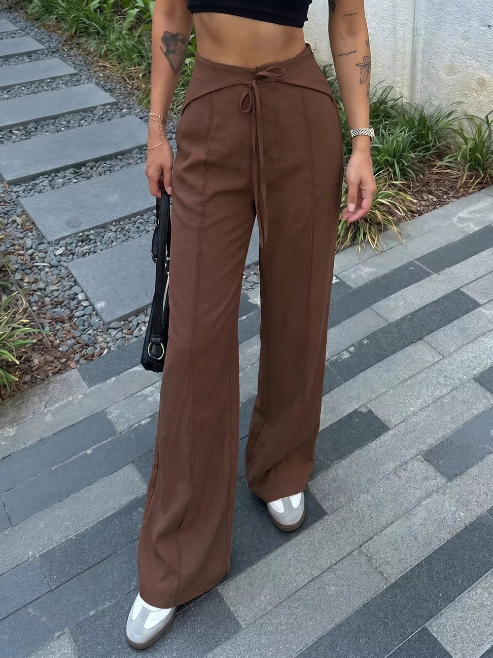 100% polyester Care instructions: Machine wash cold wide-leg pants in Brown with flared silhouette