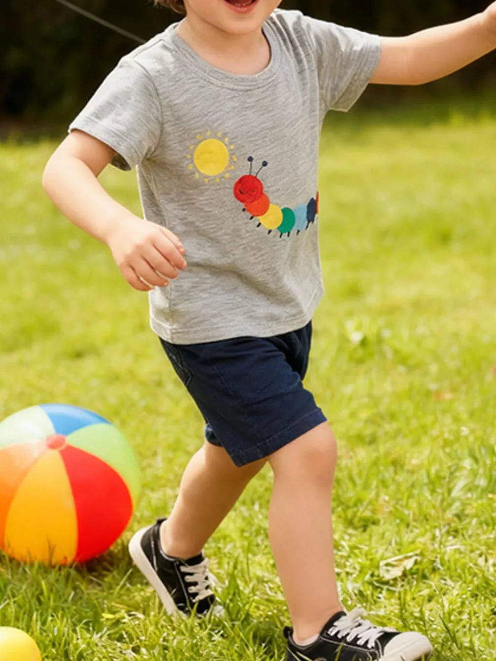 Toddler grey t-shirt with colorful caterpillar and sun graphic, short sleeves.