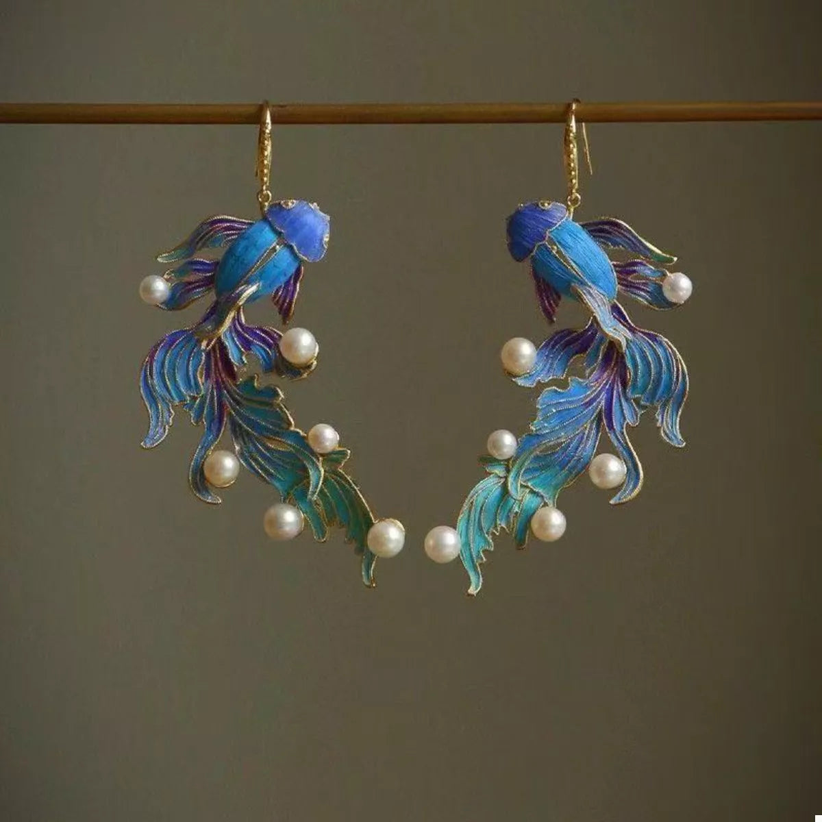 Blue goldfish dangle earrings with pearls, 18K gold-plated.