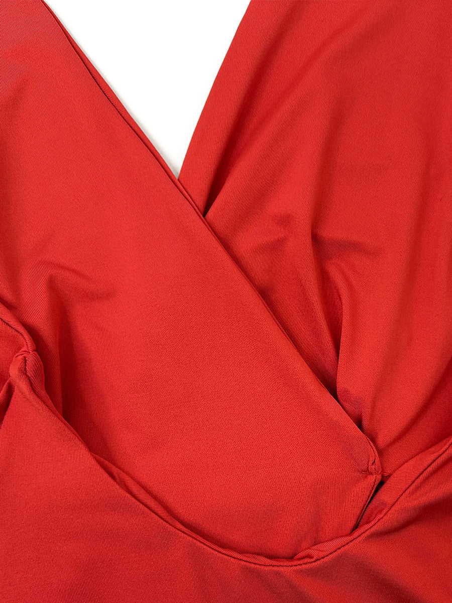 Red wrap dress with V-neck and ruched detail